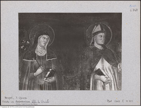 Vorderseite von Luce [https://www.deutsche-digitale-bibliothek.de/content/lizenzen/rv-ez/] Christus thronend mit Heiligen, Karl von Kalabrien, König Robert 1, Sancia von Mallorca und Johanna 1. von Neapel - Detail: Klara und Ludwig von Toulouse (oberes Teil), bh017993_recto. Foto.