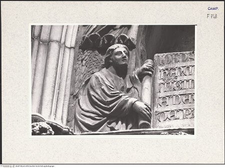 Vorderseite von Pace, Valentino [https://www.deutsche-digitale-bibliothek.de/content/lizenzen/rv-ez/] HauptportalTympanon und Archivolte: Gottvater mit Engel, Madonna - Archivolte, Engel mit Inschrift links, bh342108_recto. Foto: Pace, Valentino.