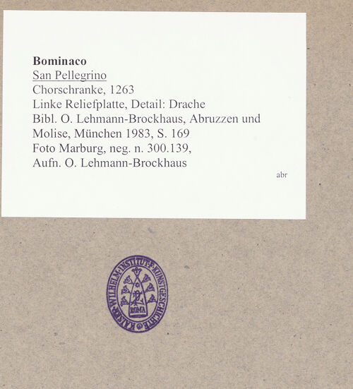 Rückseite von Foto Marburg [https://www.deutsche-digitale-bibliothek.de/content/lizenzen/rv-ez/] ChorschrankeÖstliche (linke) Reliefplatte: Geflügelter Drache mit gewundenem Schwanz - Linke Reliefplatte, Detail: Drache, bh029507_recto. Foto: Lehmann-Brockhaus, Otto.