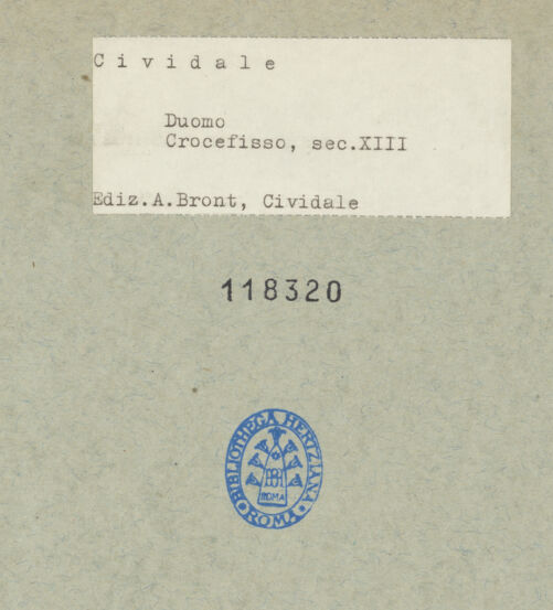 Rückseite von Edizione A. Bront, Cividale [https://www.deutsche-digitale-bibliothek.de/content/lizenzen/rv-ez/] Kruzifix (Christus Patiens) - Gesamtansicht (von links), bh118320_recto. Foto: Bront, A..