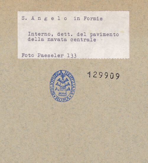 Rückseite von unbekannt [https://www.deutsche-digitale-bibliothek.de/content/lizenzen/rv-fz/] FußbodenFragmente des Fußbodens des Dianatempels - Mittelschiff, Detail: unregelmäßiges Opus tessellatum mit lateinischer Inschrift, bh129909_recto. Foto: Paeseler, Wilhelm.