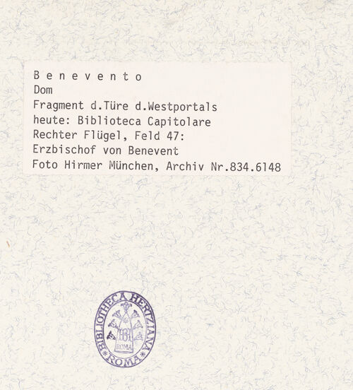 Rückseite von Hirmer [https://www.deutsche-digitale-bibliothek.de/content/lizenzen/rv-ez/] Portal mit Szenen aus dem Leben Christi und BischöfeErzbischof von Benevent - Gesamtansicht (nach den Bombentreffern), bh360846_recto. Foto: Hirmer, Albert.