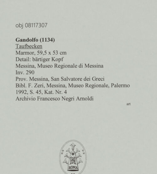 Rückseite von unbekannt [https://www.deutsche-digitale-bibliothek.de/content/lizenzen/rv-ez/] Taufbecken - Detail: bärtiger Kopf, bh606161_recto. Foto.